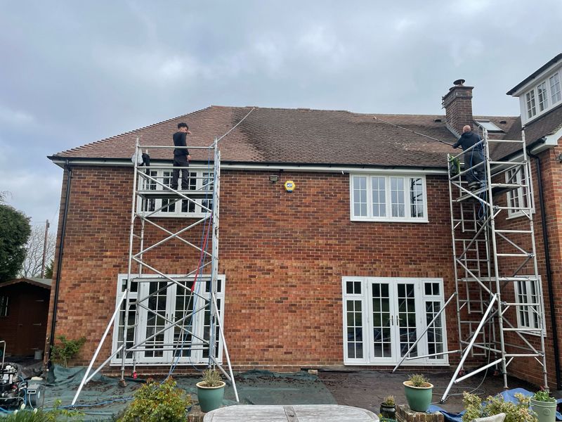 Roof cleaning carried out safely from scaffold towers by The Roof Moss Cleaners in Ascot